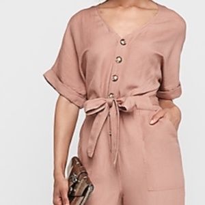 Button Front Utility Jumpsuit. medium but runs big. Please refer to measurement.